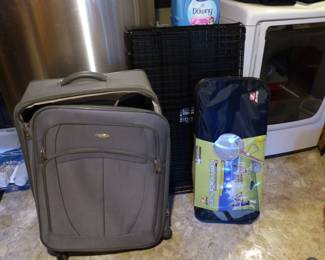 Luggage, dog crate, badminton