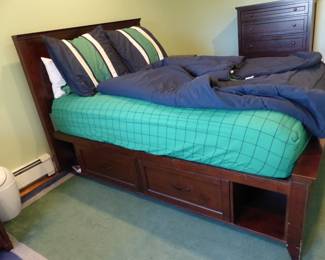 Bed with storage drawer