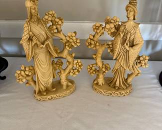 Pair of Asian lord and lady with cherry trees