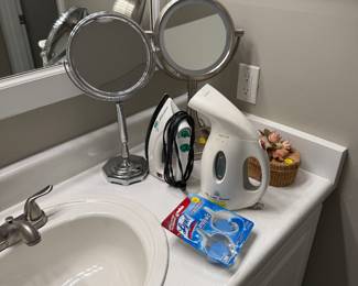 Magnifying mirrors, iron, steamer