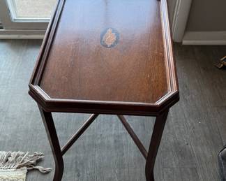 Small coffee table with inlaid shell.