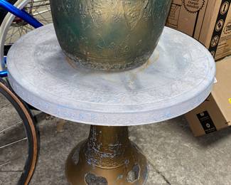 Metal pot and small table