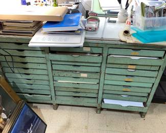 Amazing wooden cabinet work surface with sliding wood drawers to hold paper and art supplies… could be a cool kitchen island or office/ garage work cabinet