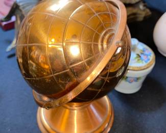 Golden globe decor with slide down top