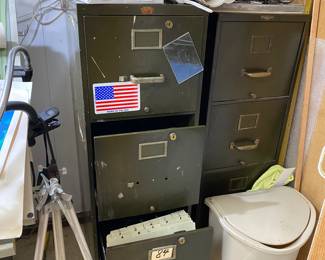 2 metal filing cabinets