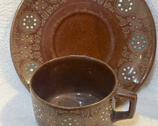 Moriage style pottery demi-tasse cup and saucer