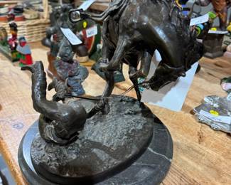 bronze statue Falling Rider by C M Russell
