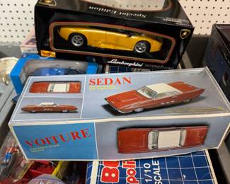 President Obama collectibles, Black Americana, vintage tin & die-cast cars, sofas, NIB items, unique board games selection several with local ties, working antique home roller organ, Edison phonograph rolls, antique stoneware Jones Boston, Mass and others, Depression etched punch bowl, advertising, Chilmark pewter sculptures, electronics and tubes, RCA, Oscilloscope, Simpson meters, sofas, loveseats, leather chair, Snoop Dogg 1974 Cadillac, advertising