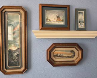 Framed artwork, including Danny Gamble art prints