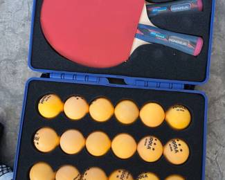 Joola Tour 2500 ping pong table with accessories, including IPong V300 automatic ball thrower, Carbon Graphite ball catch net, Butterfly Nakama P7 Paddles, Butterfly Bty-CS 2000 Paddles, Joola Rossi Smash Paddles w/ case