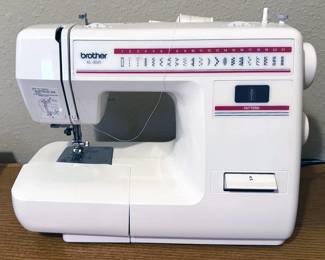 Brother XL3025 sewing machine + sewing supplies/notions
