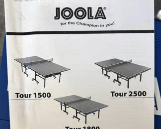 Joola Tour 2500 ping pong table with accessories, including IPong V300 automatic ball thrower, Carbon Graphite ball catch net, Butterfly Nakama P7 Paddles, Butterfly Bty-CS 2000 Paddles, Joola Rossi Smash Paddles w/ case