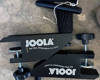 Joola Tour 2500 ping pong table with accessories, including IPong V300 automatic ball thrower, Carbon Graphite ball catch net, Butterfly Nakama P7 Paddles, Butterfly Bty-CS 2000 Paddles, Joola Rossi Smash Paddles w/ case