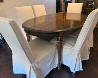 Colonial-style dining table with two leaves