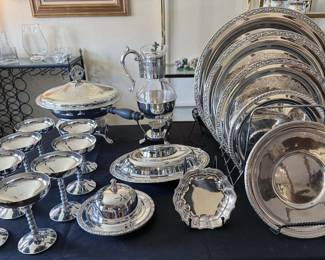 Silver plate items: bowl + tray, silverware + utensils, pitcher, platters, coupe drinkware, silverware