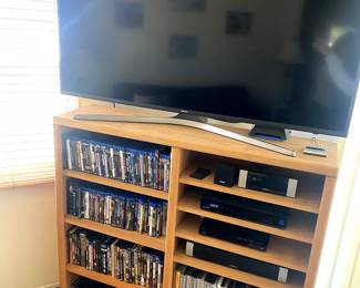 tv stand, tv, dvds
