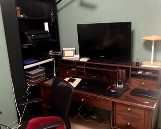 office desk, computer, bookshelf, office chair
