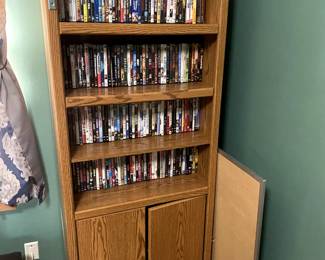 bookshelf, dvds
