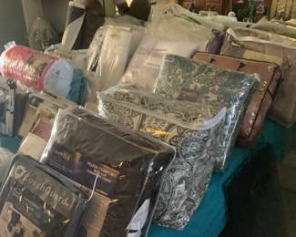 Most of the bedding is brand new and still in the package.