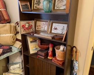 Small book shelf with tapestry art baskets