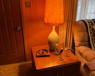 Mid century table with Mid century lamp and decor