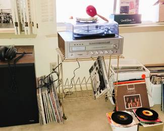 100s of records with lots of Classic Rock. All in one stereo system.  Record stands