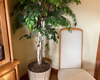Close up of the Broyhill dining chairs that go with table
Faux potted plant