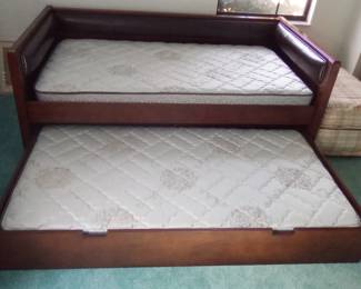 Nearly new wooden Trundle Bed with 2 Sealy Classic Support 2 FIRM mattresses that look like they have never been used. FOR SALE NOW. CALL CHRIS AT 386-405-1867