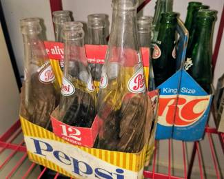 Vintage Pepsi cola bottles and carrier 