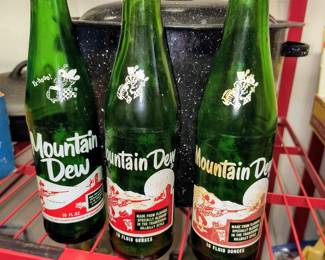 Vintage Mountain Dew bottles w/ "Willie"