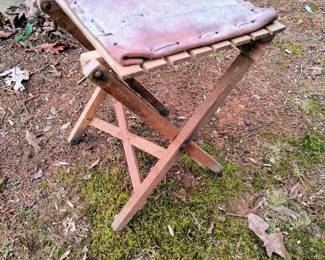 Leather topped folding stool 