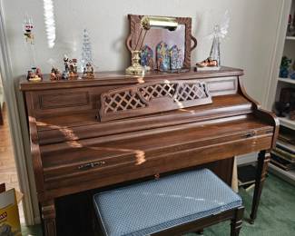 View of the piano, comes with bench
