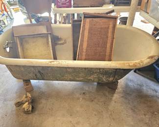 great metal bath tub and 4 feet, outside needs painting, enamel on inside is good