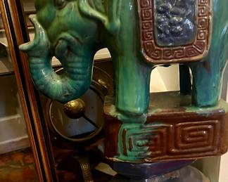 These are the real thing!  A pair of small polychrome glazed terracotta elephants circa 1900.