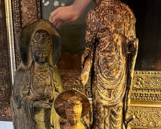 Thee large antique bronze statues…