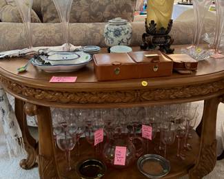 Demilune table, pink glassware, men’s leather cufflink jewelry box, porcelain