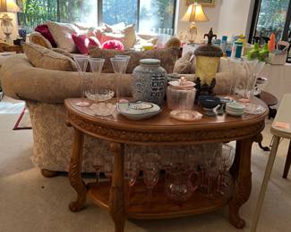Living room couches, demilune table, lamps, glass etc