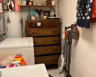 Laundry room with washer and dryer, vacuum, steam mop, chest of drawers, etc