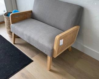Cute light oak wood bench/love seat.