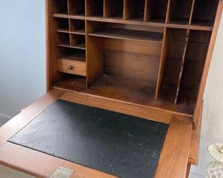 Vintage drop front desk with front open.