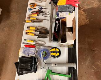 Chemical Resistant Apron & Gloves, Caulk guns, Garden Hand Tools, Level, Outdoor Faucet Handles, Chisel, Aluminum Edging, Hearing Protection Headphones, Amber Safety Immiter, Work Gloves