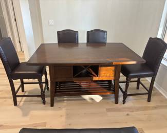 Dinning Tables 4 chairs and a bench.                               Table: 62"L 40"W 36"T                                                                                     Chairs: 20"W 20"D 44"T                                                                                  Bench: 40"W 17"D 24"T