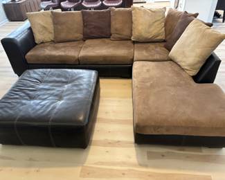 2 pc Sectional Sofa Browns faux leather and suede with ottoman. $ 450.00   (1) Sofa: 90"L 36"D 26.5"T   (2) Sofa: 80"L 36"D 26.5"T Pillow back, Ottoman: 42"x 42" x 17"