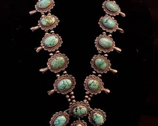 One of several large squash blossom necklaces