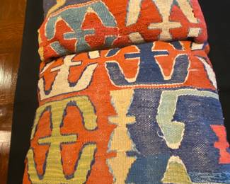A sample of numerous colorful throw pillows available.