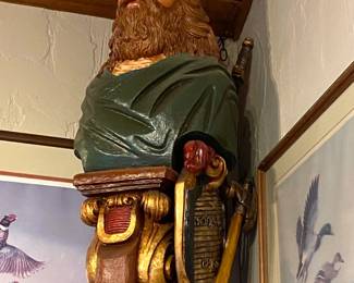 This is a huge sculpture of King Poseidon.  As I am entering this picture, he is still holding court by the ceiling corner...we'll have him down for your perusal by the time of the sale.  He would be great in a den or a man cave...particularly if you are a sailor.