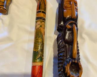 Details on a pair of walking sticks/canes from the collection.