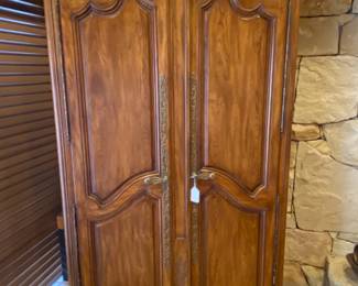 Fine quality 2 door cabinet by the Hickory Chair Company that has great storage and room for entertainment electronics.