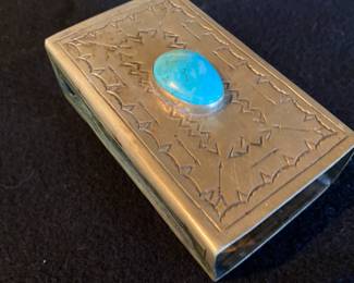 Matchbox cover with large turquoise center stone.  This holds a full size box of wooden matches.
