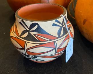 Sweet Native American clay pot.  Signed.
